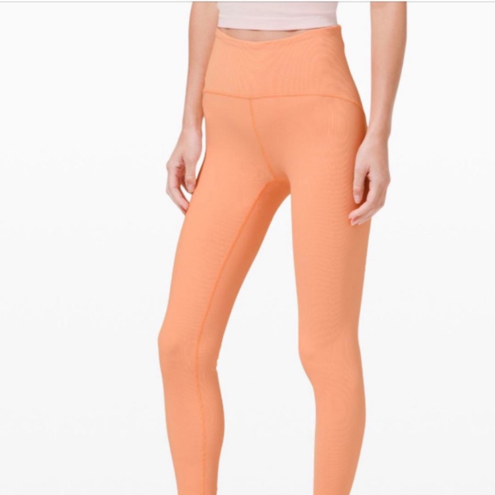 Lululemon Align Cropped Leggings in a peachy pink